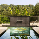 Infinity pool with lotus tile design and forest view at Villa Raag, Kairali Ayurvedic Group’s luxury wellness retreat in Goa.