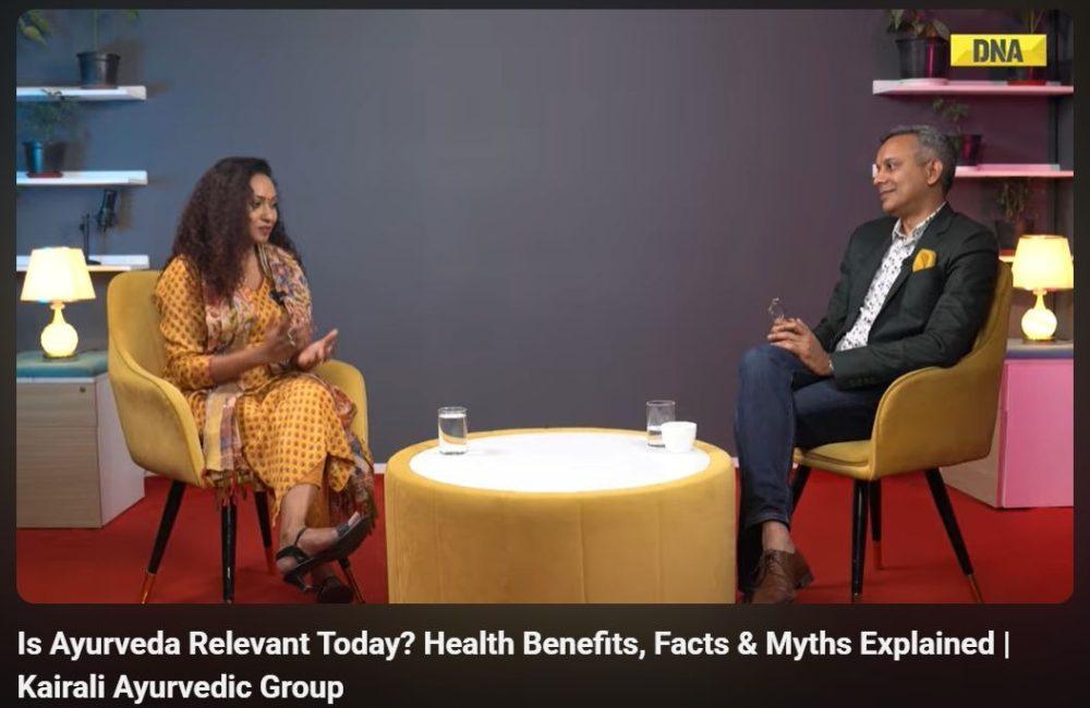 Two people in a studio discussing “Is Ayurveda Relevant Today?”—a seated interview about health benefits, facts and myths by Kairali Ayurvedic Group.