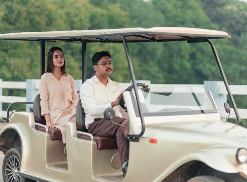 Eco-friendly buggy escort for a solo female guest at Kairali – The Ayurvedic Healing Village, Kerala, India.
