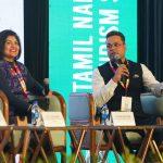 Panelists discuss everyday wellness in travel at a Tamil Nadu Tourism event; a Kairali Ayurvedic Group representative speaks.