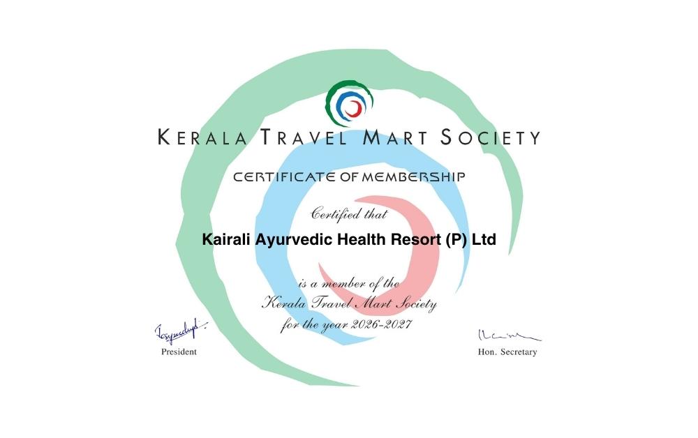 Elegant woman in traditional saree representing Kerala’s cultural hospitality and wellness tourism experience