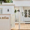 Entrance of Villa Raag, a luxury wellness villa in South Goa with elegant white architecture and tropical surroundings