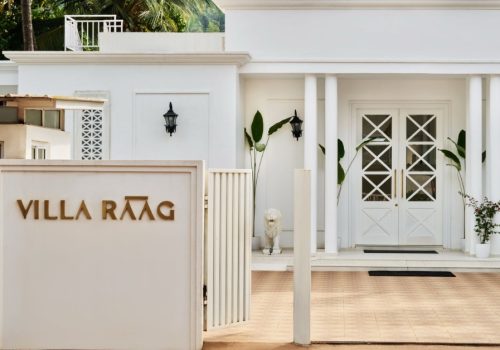 Entrance of Villa Raag, a luxury wellness villa in South Goa with elegant white architecture and tropical surroundings