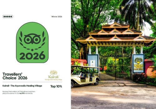 TripAdvisor Travelers’ Choice Award 2026 badge displayed alongside the entrance of Kairali – The Ayurvedic Healing Village in Palakkad, Kerala, recognised among the top 10% of listings worldwide based on traveller reviews.