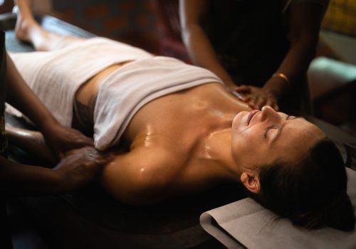 Karkidaka Masam Ayurveda oil massage therapy at traditional Kerala wellness center