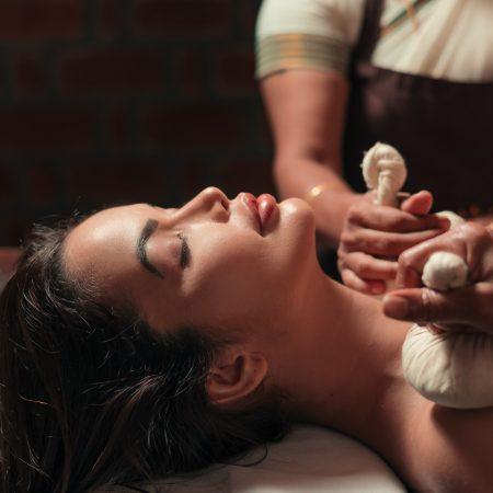 Ayurvedic remedies for acidity include herbal potli massage therapy for relaxation and healing