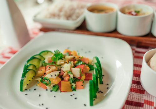 Varsha Ritucharya diet plate at Kairali with fresh salad, cucumber and monsoon-friendly ingredients