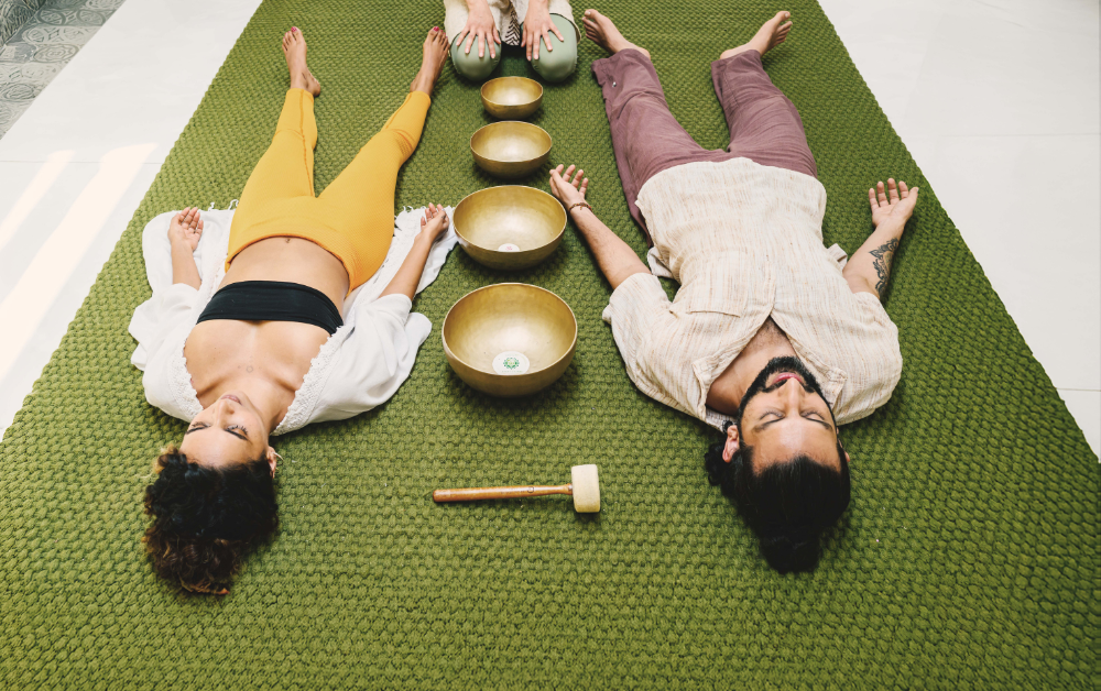 Guests relaxing during a sound healing session at Villa Raag Goa wellness hotel